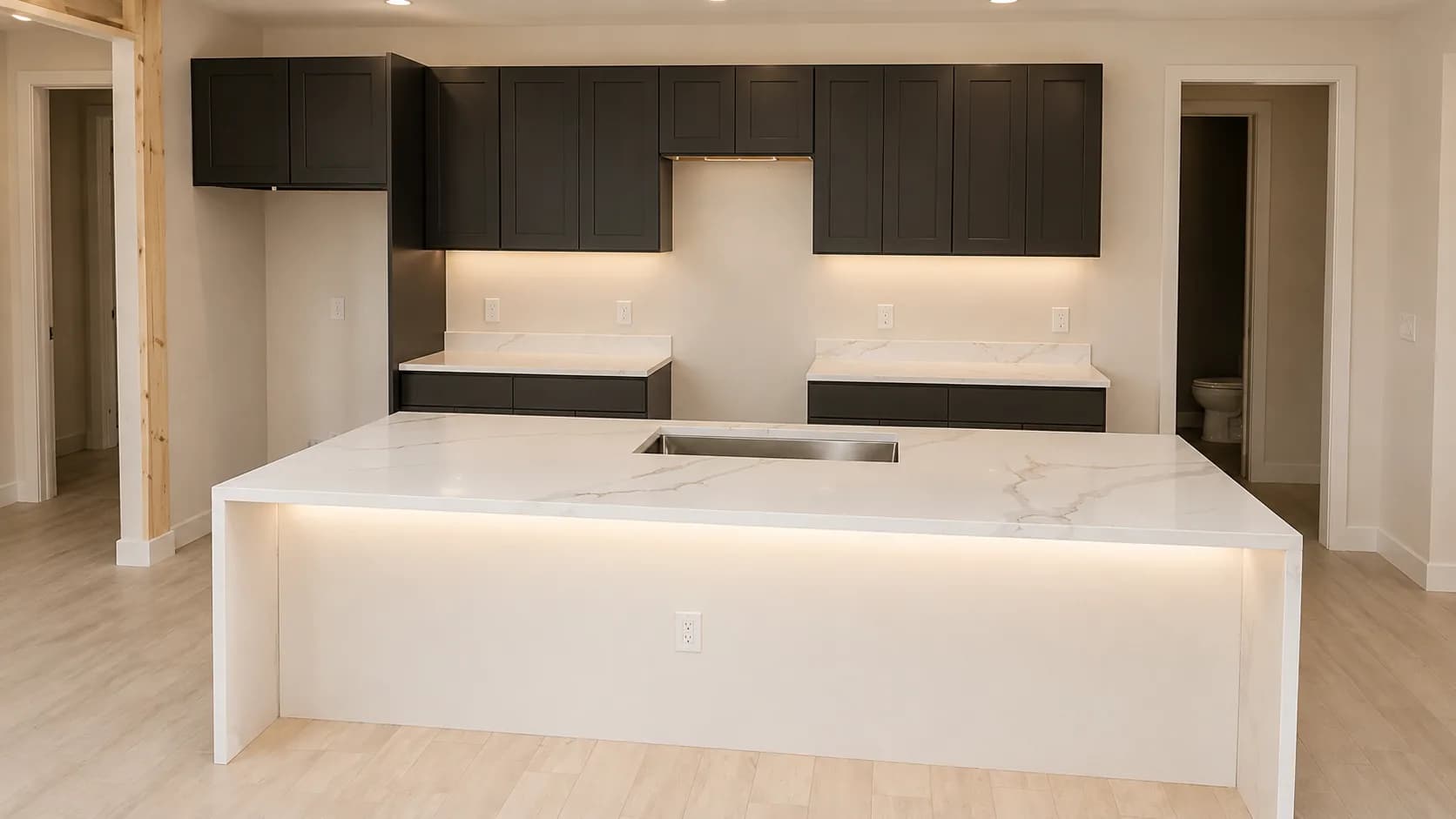 Modern matte black cabinetry with floating shelves