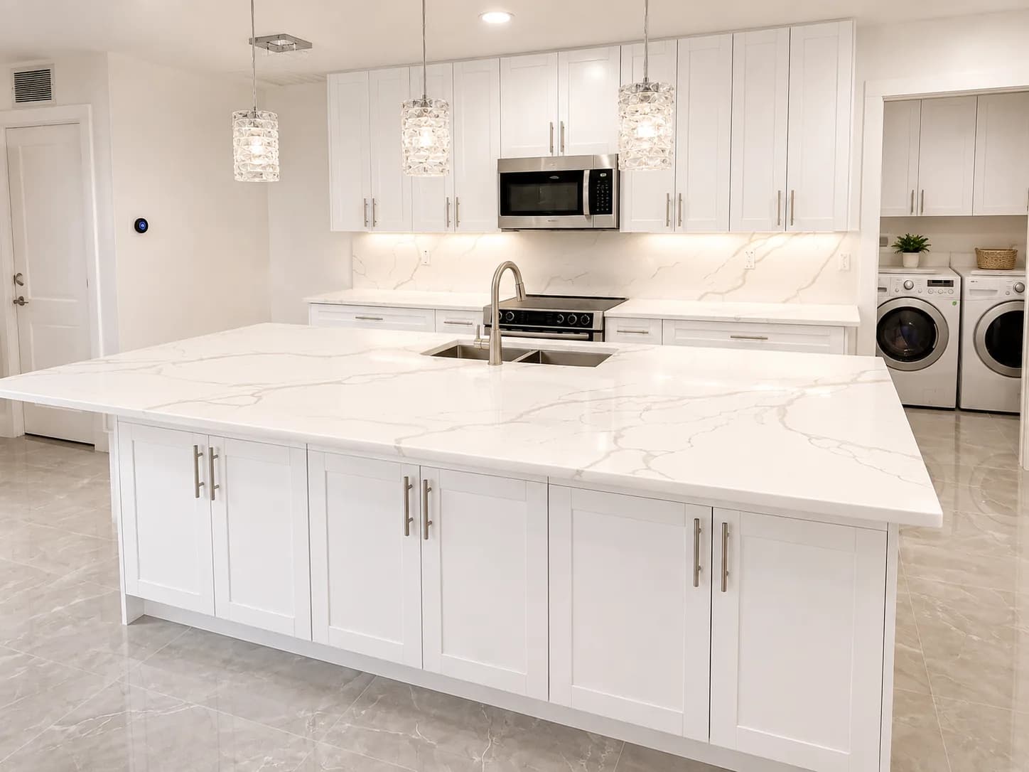 Remodeled kitchen with adjoining laundry room
